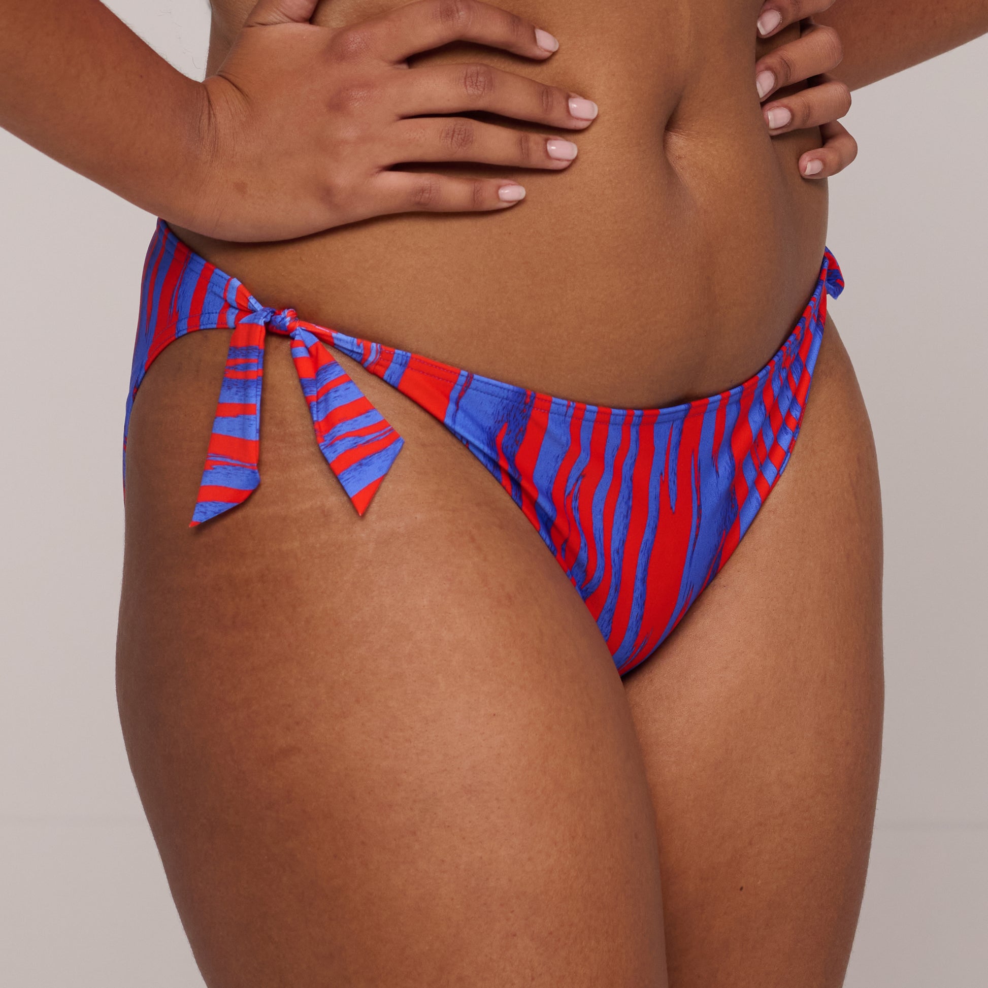 PrimaDonna Swim Skudai bikini heupslip met koordjes Wild stripes