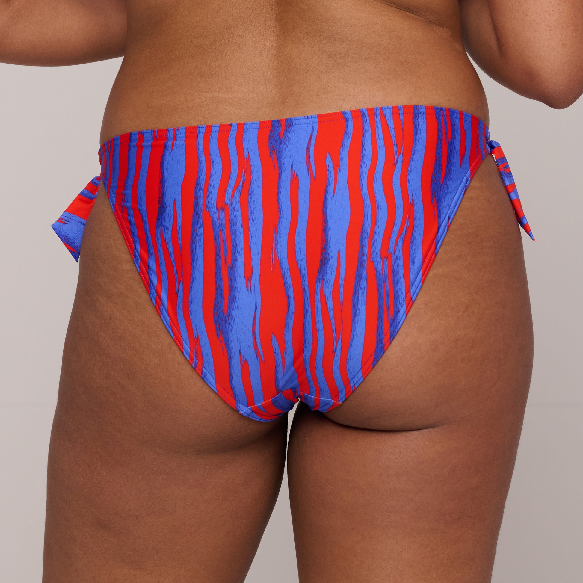 PrimaDonna Swim Skudai bikini heupslip met koordjes Wild stripes